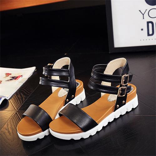 The buckle strap sandals.