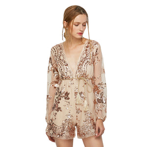 The Plunging Neck Sequin Sash Romper.