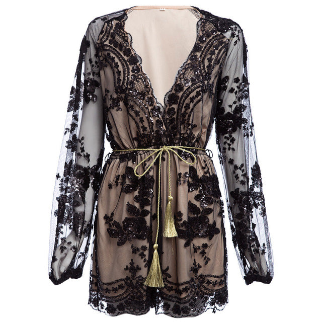 The Plunging Neck Sequin Sash Romper.