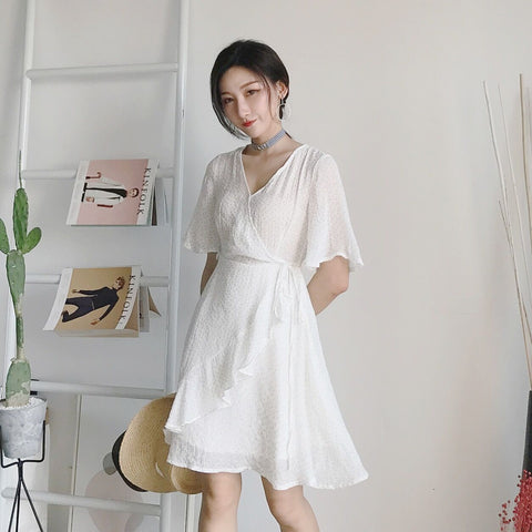 The Knee-length White Dress